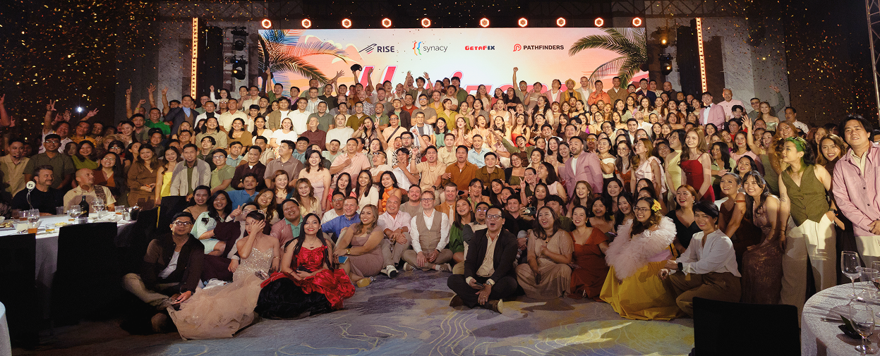 Employees from various sites gathered for a group photo at the company’s year-end celebration.